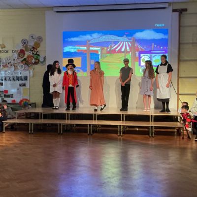 Children rehearsing for their play